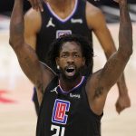 Los Angeles Clippers guard Patrick Beverley, below, celebrates as guard Terance Mann stands in the background during the first half in Game 6 of the NBA basketball Western Conference Finals against the Phoenix Suns Wednesday, June 30, 2021, in Los Angeles. (AP Photo/Mark J. Terrill)