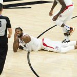 Los Angeles Clippers guard Paul George looks for a foul call from referee Pat Fraher (26) during the second half of game 5 of the NBA basketball Western Conference Finals against the Phoenix Suns, Monday, June 28, 2021, in Phoenix. (AP Photo/Matt York)