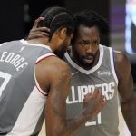 Los Angeles Clippers guard Paul George, left, and guard Patrick Beverley talk during the second half in Game 4 of the NBA basketball Western Conference Finals against the Phoenix Suns Saturday, June 26, 2021, in Los Angeles. (AP Photo/Mark J. Terrill)