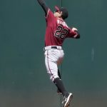 Arizona Diamondbacks right fielder Josh Reddick makes a leaping catch on a fly ball during the fifth inning of a baseball game Wednesday, June 9, 2021, in Oakland, Calif. (AP Photo/Tony Avelar)