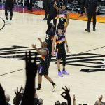 The Phoenix Suns celebrate during the second half of Game 1 of an NBA basketball second-round playoff series against the Denver Nuggets, Monday, June 7, 2021, in Phoenix. (AP Photo/Matt York)