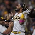 San Diego Padres' Fernando Tatis Jr. reacts after hitting a two-run home run during the fourth inning of a baseball game against the Arizona Diamondbacks, Friday, June 25, 2021, in San Diego. (AP Photo/Gregory Bull)