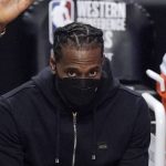 Los Angeles Clippers forward Kawhi Leonard sits on the bench during the first half in Game 6 of the NBA basketball Western Conference Finals against the Phoenix Suns Wednesday, June 30, 2021, in Los Angeles. (AP Photo/Mark J. Terrill)