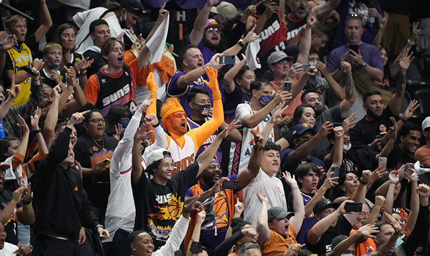Phoenix Suns fans cheer as time runs out in the second half of Game 4 of an NBA second-round playof...