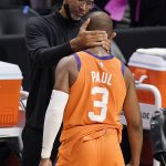Phoenix Suns head coach Monty Williams, left, embraces Chris Paul as time runs out in Game 6 of the NBA basketball Western Conference Finals against the Los Angeles Clippers Wednesday, June 30, 2021, in Los Angeles. The Suns won the game 130-103 to take the series 4-2. (AP Photo/Mark J. Terrill)
