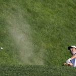 Scottie Scheffler hits from a bunker on the 12th fairway during the first round of the Travelers Championship golf tournament at TPC River Highlands, Thursday, June 24, 2021, in Cromwell, Conn. (AP Photo/John Minchillo)