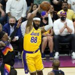 Los Angeles Lakers forward Markieff Morris (88) rebounds against the Phoenix Suns during the first half of Game 5 of an NBA basketball first-round playoff series, Tuesday, June 1, 2021, in Phoenix. (AP Photo/Matt York)
