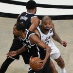 Milwaukee Bucks' P.J. Tucker (17) fights through a pick set by Brooklyn Nets' Bruce Brown, top left, to defend against Kevin Durant, bottom left, during the first half of Game 7 of a second-round NBA basketball playoff series Saturday, June 19, 2021, in New York. (AP Photo/Frank Franklin II)