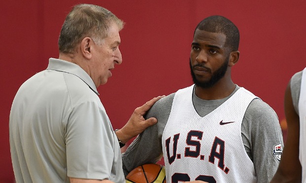 USA Basketball Chairman and Men's National Team Managing Director Jerry Colangelo (L) talks with Ch...