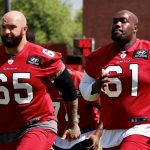 Offensive linemen Brian Winters (left) and Rodney Hudson (right) go through warmups during Day 3 of Cardinals minicamp Thursday, June 10 2021, in Tempe. (Tyler Drake/Arizona Sports)