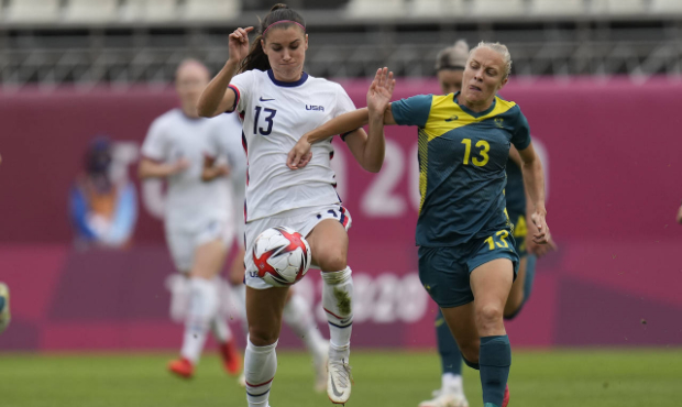 United States' Alex Morgan, left, and Australia's Tameka Yallop battle for the ball during a women'...