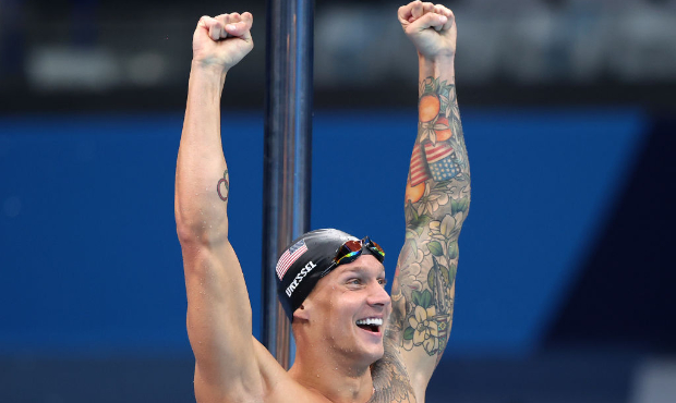 Caeleb Dressel of Team United States reacts after winning the gold medal in the Men's 4 x 100m Free...
