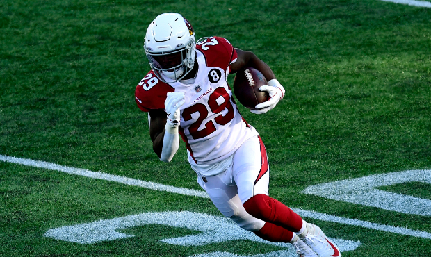 Chase Edmonds #29 of the Arizona Cardinals carries the ball against the New England Patriots during...