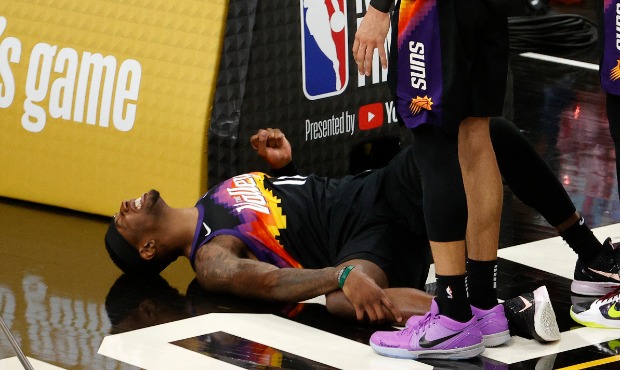 Torrey Craig #12 of the Phoenix Suns reacts during the second half in Game Two of the NBA Finals ag...