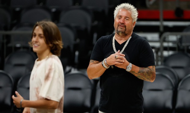 Television personality Guy Fieri watches his son Hunter on the court following game two of the NBA ...