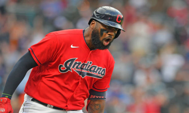 Franmil Reyes #32 of the Cleveland Indians celebrates as he rounds the bases after hitting a three ...