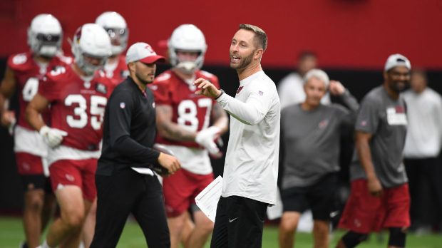Head coach Kliff Kingsbury of the Arizona Cardinals directs passing drills during Training Camp at ...