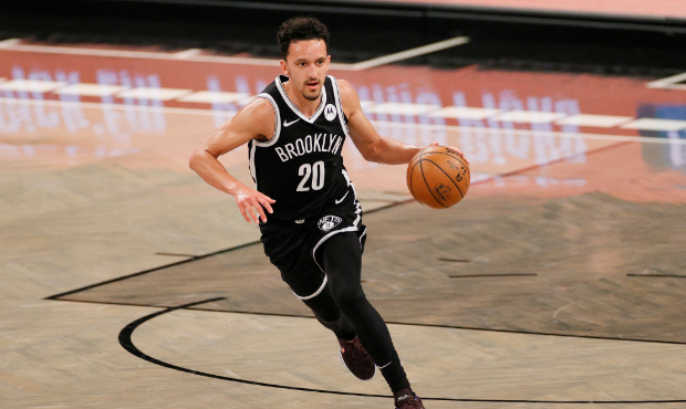 Landry Shamet #20 of the Brooklyn Nets dribbles during the second half against the Boston Celtics a...