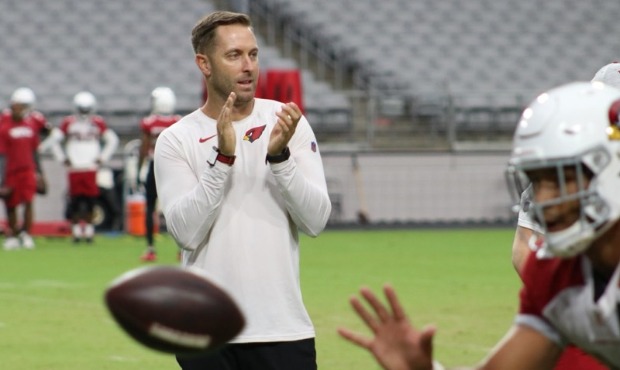 Cardinals head coach Kliff Kingsbury encourages his players during training camp Friday, July 30, 2...