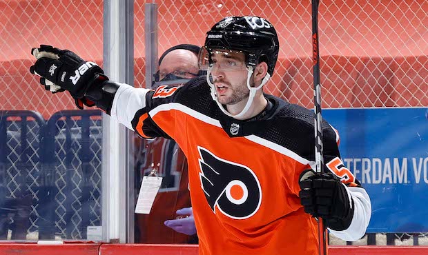Shayne Gostisbehere #53 of the Philadelphia Flyers calls to teammates during the second period agai...