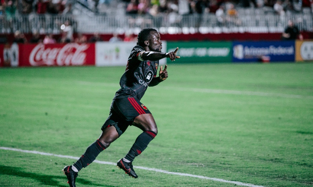 Phoenix Rising FC captain Solomon Asante celebrates after scoring a goal against LA Galaxy II in a ...