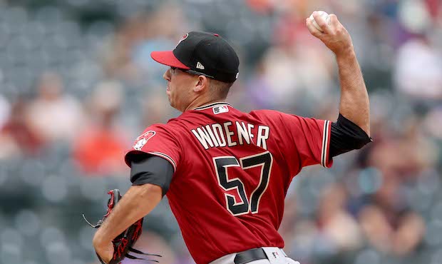 MAY 23: Starting pitcher Taylor Widener #57 of the Arizona Diamondbacks throws in the first inning ...