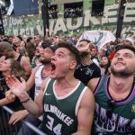 
              Fans watch Game 6 of the NBA basketball finals between the Milwaukee Bucks and the Phoenix Suns Tuesday, July 20, 2021, in Milwaukee. (AP Photo/Jeffrey Phelps)
            