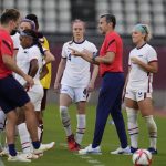 United States' coach Vlatko Andonovski, 2nd right, talks with his players before the second half of a women's soccer match against Australia at the 2020 Summer Olympics, Tuesday, July 27, 2021, in Kashima, Japan. (AP Photo/Fernando Vergara)