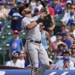 Arizona Diamondbacks first baseman Christian Walker catches a fly ball hit by Chicago Cubs' Javier Baez during the fifth inning of a baseball game in Chicago, Saturday, July 24, 2021. (AP Photo/Nam Y. Huh)