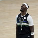 
              Milwaukee Bucks center Bobby Portis (9) reacts during the first half of Game 6 of basketball's NBA Finals against the Phoenix Suns Tuesday, July 20, 2021, in Milwaukee. (AP Photo/Aaron Gash)
            