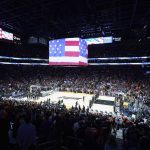 The Milwaukee Bucks and the Phoenix Suns stand for the national anthem prior to Game 1 of basketball's NBA Finals, Tuesday, July 6, 2021, in Phoenix. (AP Photo/Ross D. Franklin)