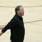 Milwaukee Bucks head coach Mike Budenholzer argues with officials during the second half of Game 1 of basketball's NBA Finals against the Phoenix Suns, Tuesday, July 6, 2021, in Phoenix. The Suns defeated the Bucks 118-105. (AP Photo/Ross D. Franklin)