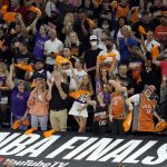Fans cheer before Game 5 of basketball's NBA Finals between the Phoenix Suns and the Milwaukee Bucks, Saturday, July 17, 2021, in Phoenix. (AP Photo/Matt York)