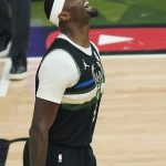 Milwaukee Bucks center Bobby Portis (9) reacts during the first half of Game 6 of basketball's NBA Finals against the Phoenix Suns in Milwaukee, Tuesday, July 20, 2021. (AP Photo/Paul Sancya)