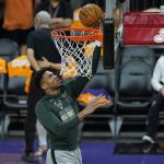 Milwaukee Bucks forward Giannis Antetokounmpo warms up before Game 5 of basketball's NBA Finals against the Phoenix Suns, Saturday, July 17, 2021, in Phoenix. (AP Photo/Ross D. Franklin)