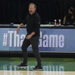 Milwaukee Bucks head coach Mike Budenholzer reacts during the first half against the Phoenix Suns in Game 4 of basketball's NBA Finals in Milwaukee, Wednesday, July 14, 2021. (AP Photo/Paul Sancya)