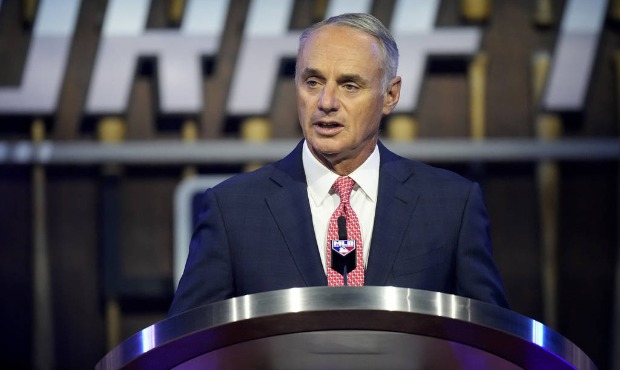 MLB Commissioner Rob Manfred kicks off the first round of the 2021 MLB baseball draft, Sunday, July...