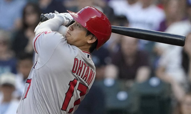 Los Angeles Angels' Shohei Ohtani watches his solo home run during the third inning of the team's b...