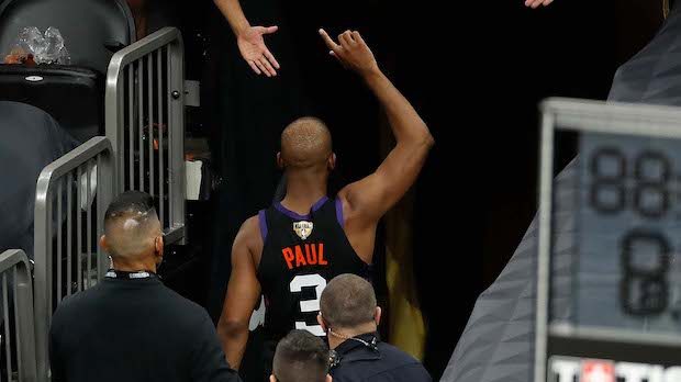 Chris Paul #3 of the Phoenix Suns leave the court after the team's win against the Milwaukee Bucks ...