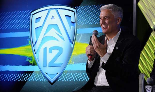 Pac-12 Commissioner George Kliavkoff fields questions during the Pac-12 Conference NCAA college foo...