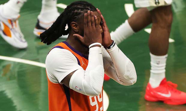 Jae Crowder #99 of the Phoenix Suns reacts against the Milwaukee Bucks during the second half in Ga...