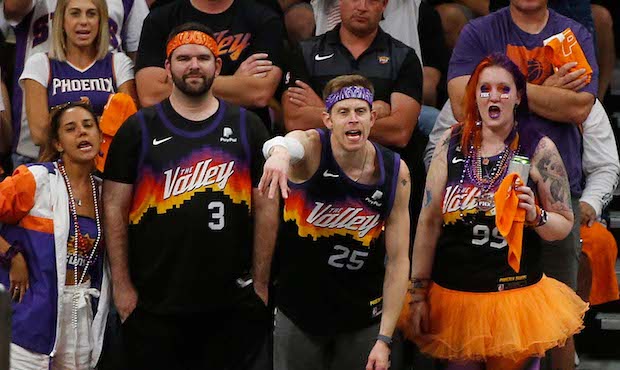 Phoenix Suns fans cheer on their team in the first half in Game Two of the NBA Finals between the M...