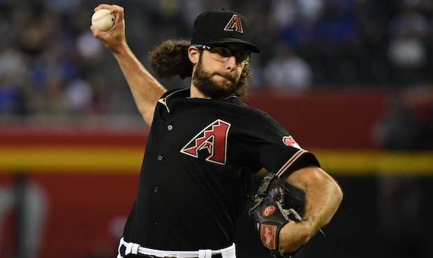 Zac Gallen #23 of the Arizona Diamondbacks delivers a first inning pitch against the Chicago Cubs a...