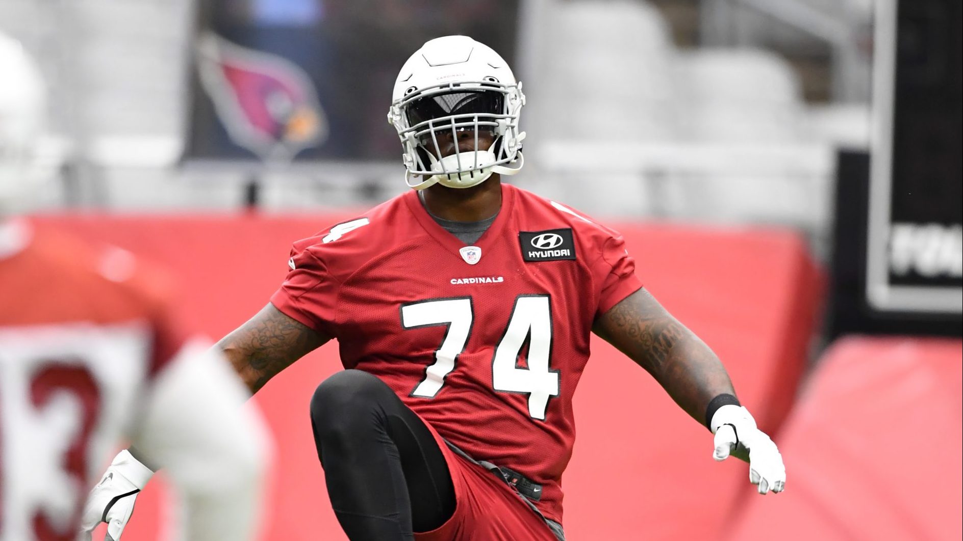 D.J. Humphries #74 of the Arizona Cardinals stretches during Training Camp at State Farm Stadium on...