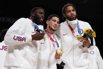 SAITAMA, JAPAN - AUGUST 07: Draymond Green, Devin Booker, and Javale McGee of Team United States p...
