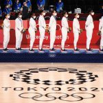 SAITAMA, JAPAN - AUGUST 08: Team United States stand for the national anthem during the Women's Basketball medal ceremony on day sixteen of the 2020 Tokyo Olympic games at Saitama Super Arena on August 08, 2021 in Saitama, Japan. (Photo by Mike Ehrmann/Getty Images)