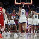 United States players celebrate their win in the women's basketball gold medal game against Japan at the 2020 Summer Olympics, Sunday, Aug. 8, 2021, in Saitama, Japan. (AP Photo/Charlie Neibergall)