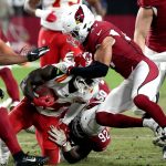 Kansas City Chiefs running back Darwin Thompson is tackled by Arizona Cardinals linebacker Zeke Turner, right, during the second half of an NFL football game, Friday, Aug. 20, 2021, in Glendale, Ariz. (AP Photo/Rick Scuteri)