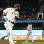 Pittsburgh Pirates' Yoshi Tsutsugo (32) rounds the bases after hitting a solo home run in the seventh inning of a baseball game against the Arizona Diamondbacks, Monday, Aug. 23, 2021, in Pittsburgh. (AP Photo/Keith Srakocic)