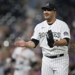Colorado Rockies relief pitcher Jhoulys Chacin reacts after second baseman Brendan Rodgers caught a line drive by Arizona Diamondbacks' David Peralta with the bases loaded for the third out in the seventh inning of a baseball game Friday, Aug. 20, 2021, in Denver. (AP Photo/David Zalubowski)